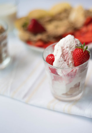 summer food concept, lifestyle. tasty summer fresh pink strawberry ice cream desert with fruits. 