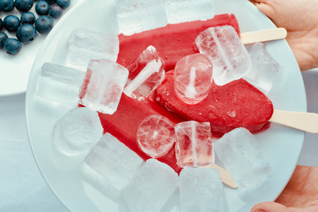 delicious tasty appetizing hand made ice cream with fruits with strawberry blueberry and ice,...
