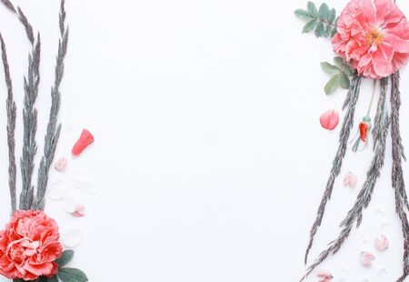 Romantic flower flat lay with empty space for text.の写真素材