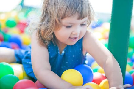Adorable little sisters ready for trick or treat, wearing halloween costumesの写真素材