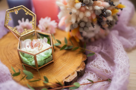 Wedding rings in jewelry box, romantic vintage style.