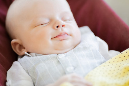 Adorable smiling sleeping newborn baby??