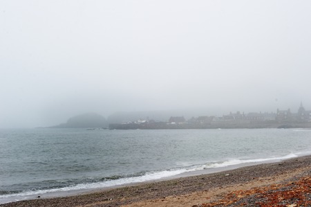 View of fog evening on the noth sea beach in Scotlandの写真素材