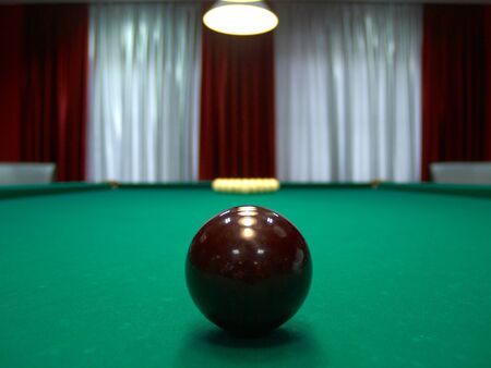 Big brown ball against white balls under the bulbの写真素材