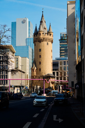 Frankfurt am Main, Germany - March 16, 2017: Purple pipe against the Eschenheimer Turm with General Electric building on the background, view from Taubenstrasseのeditorial素材