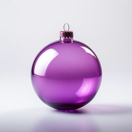 Purple Christmas ball on pastel background. Flat lay, top view with copy spaceの素材