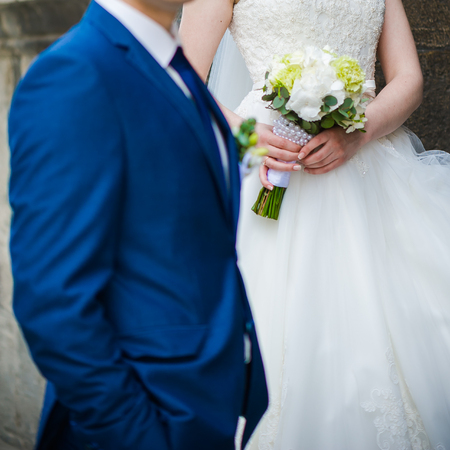 Beautiful bride with bouquetの写真素材