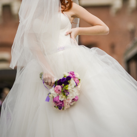 Beautiful bride with bouquetの写真素材