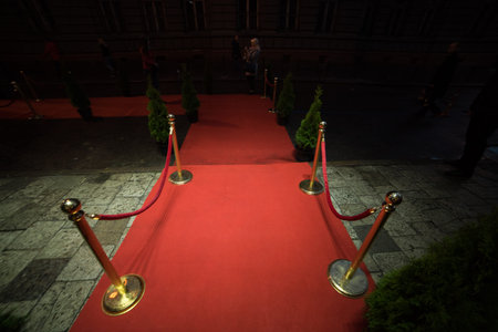 red carpet - is traditionally used to mark the route taken by heads of state on ceremonial and formal occasionsの写真素材