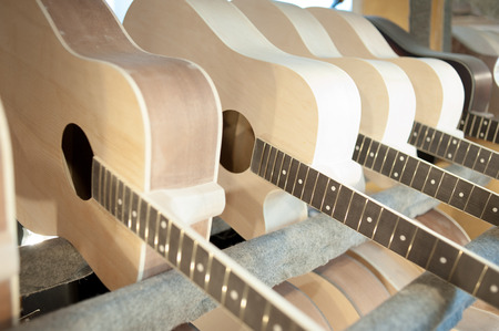 factory for the production of bent wood products. Tools for processing and gluing. Manufacture of guitars and stringed musical instruments.の写真素材