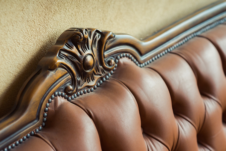 Old leather furniture with wooden insertsの写真素材