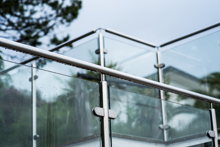 Metal railings and glass wall outdoorの写真素材