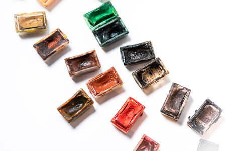 Colorful watercolor paints isolated on white background, studio shot.の写真素材