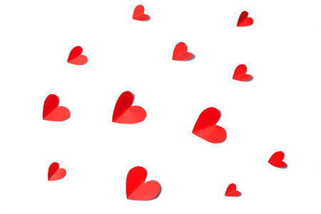Red paper hearts isolated on white background. Valentine's day concept.