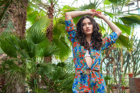 Beautiful young woman wearing summer clothes on tropical resortの写真素材