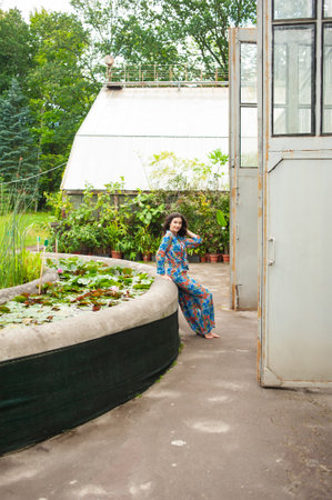 Beautiful young woman wearing summer clothes on tropical resortの写真素材