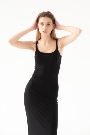 Model test portrait with young beautiful fashion model posing on background.の写真素材