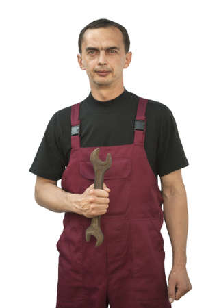 A young man in the form of working with the key in the hands ofの写真素材