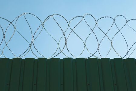 fence with barbed wireの写真素材