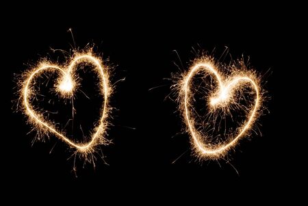 Two hearts drawn sparklerの写真素材