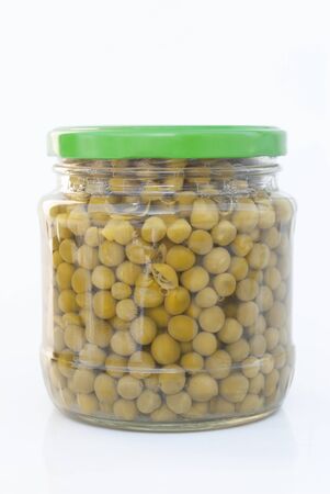 Canned green peas in glass jarの写真素材