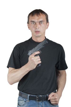 Man with a gun in his hand.の写真素材