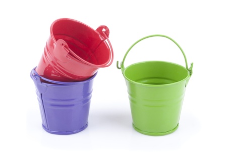 Three buckets of different colors, isolated on white background の写真素材