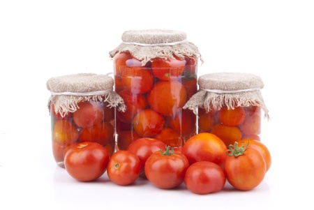 Fresh and canned tomatoes の写真素材