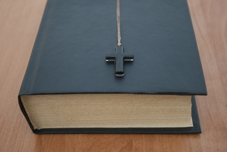 Cross lying on the Bibleの写真素材