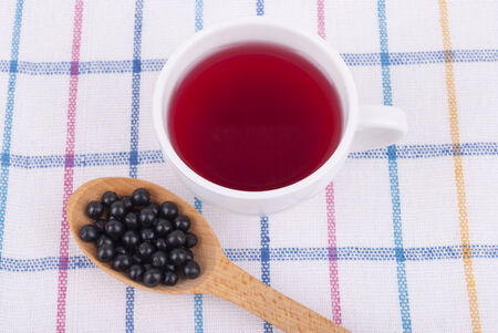 Tea made from berries of black elderberry.の写真素材