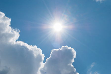 Sun comes out from under the clouds. Heavenly landscape.