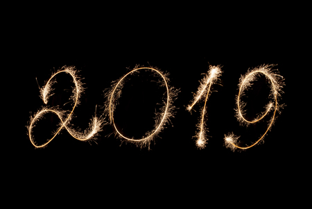 2019 inscription sparklers on a black background.の写真素材