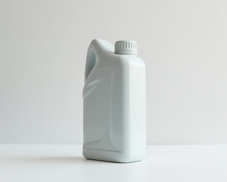 A sturdy utility bottle crafted for holding liquids stands upright on a plain surface. The smooth design and neutral color suggest practicality and cleanliness in a minimalistic setting.の素材