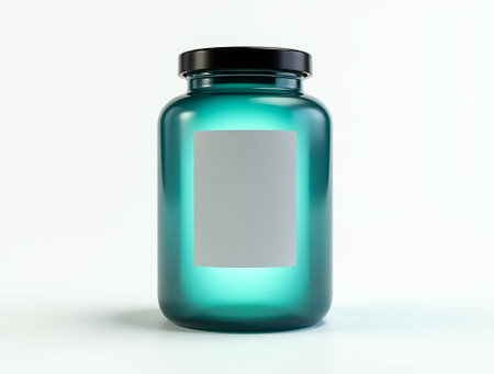 A glass jar features a sleek design with a black lid and an empty label, set against a neutral backdrop, highlighting its modern look and versatility.の素材