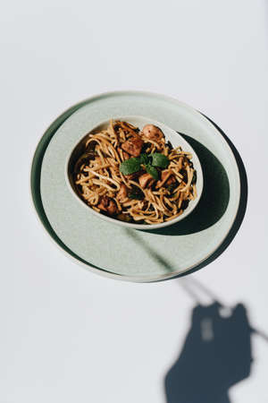 eating, rice, asia, view, beef, cooked, indo-chinese, dark background, sticks, sichuan sauce, capsicum, cup, delicious, top, black background, noodles, indian cuisine, international, cheap.の写真素材