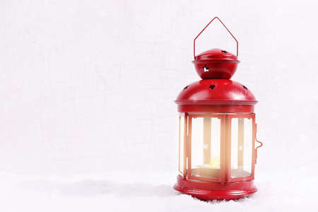 Christmas Scene. Holiday Greeting Card Design with Red Lantern snowの写真素材