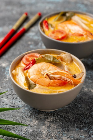 Thai tom yum soup with prawns and coconut milkの写真素材