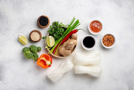 Raw ingredients for cooking noodle soup on stone background. Top viewの写真素材