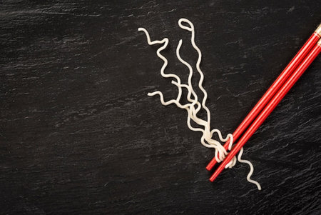 chopsticks on a black background, chopsticks on a black backgroundの写真素材