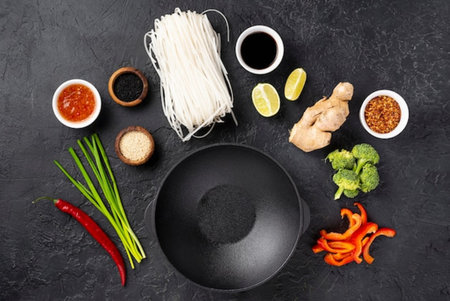 Asian food ingredients for cooking on black background. Top view, flat layの写真素材
