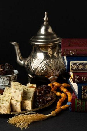Traditional oriental sweets on a black background. Ramadan Kareem.の写真素材