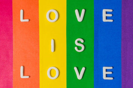 Love is love words on rainbow background. Valentines day concept.の写真素材