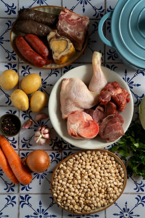 Ingredients for chinese soup - chicken drumstick, chickpeas, carrots, onions, garlic and spicesの写真素材