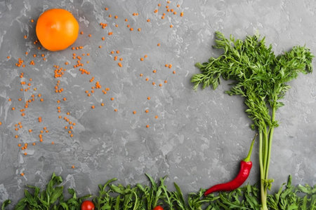 Fresh vegetables and spices on grey background, top view. Space for text