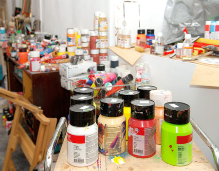 Acrylic paints closeup on a table in artist's Studio
