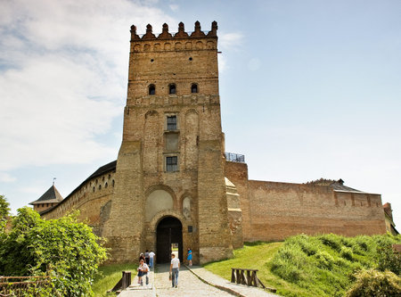 Lutsk, Ukraine - June 01, 2011: Tourists are visiting Lubart's Castle. Lutsk High Castle (Lubart's...