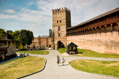 Lutsk, Ukraine - June 01, 2011: Tourists are visiting Lubart's Castle. Lutsk High Castle (Lubart's Castle), began its life in the mid-14th century as the fortified seat of Gediminas' son Lubartのeditorial素材