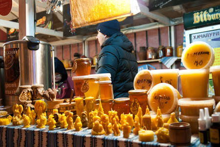 Kyiv, Ukraine - Jan 8, 2017: One of the stalls with different festive statues made of wax at the traditional Christmas market on Sophia Square in Kyiv.  There are many stalls selling gifts and also serving up seasonal food and drink.のeditorial素材