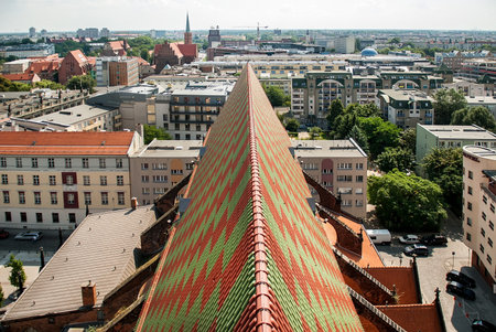 The view from the bell tower on the roof, decorated with the pattern from the colorful tiles, Wroclaw, Polandの写真素材