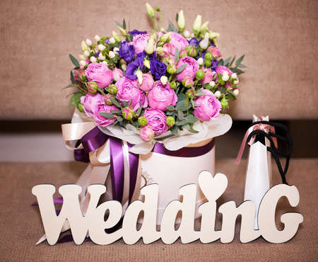 Flower bouquet, gift and wedding lettersの写真素材